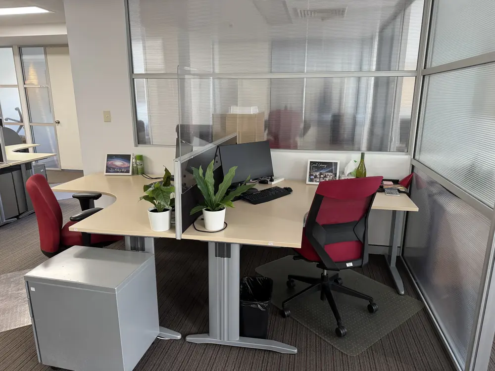 Tidy office workstations cleaned weekly by Apex Corporate Cleaning
