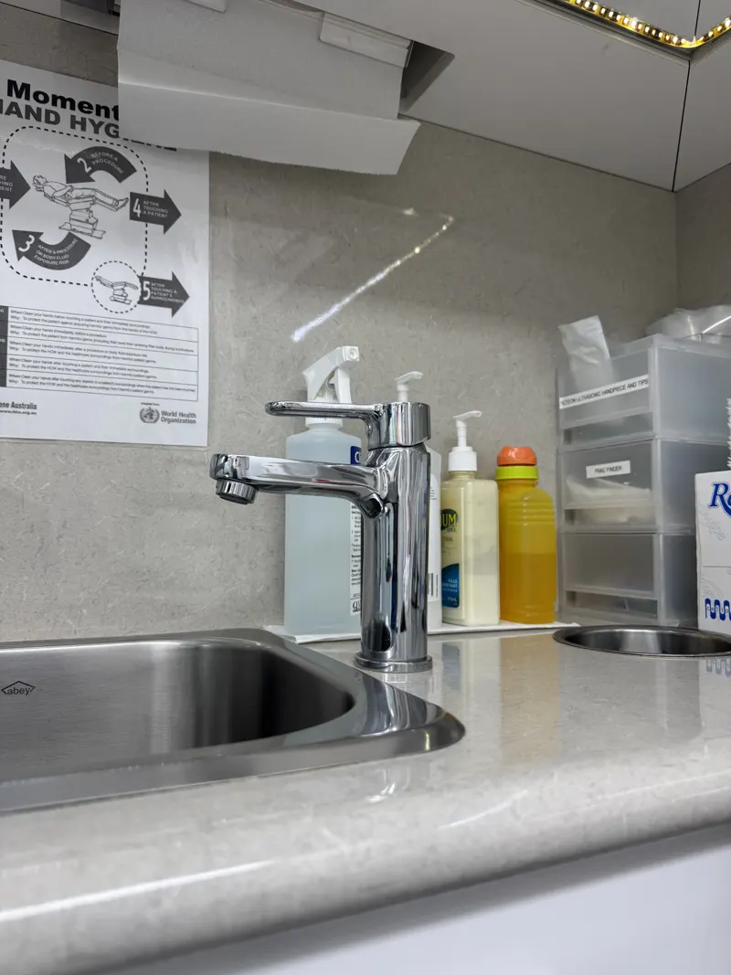 Polished stainless steel office sink and clean benchtop after an Apex clean